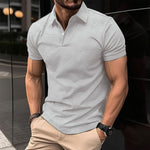 Detail of men's solid color polo shirt
